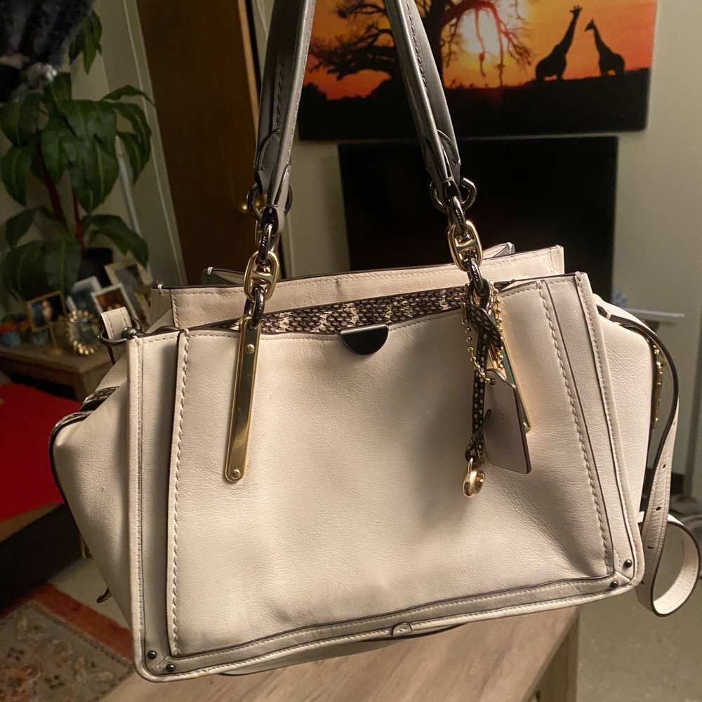 Slightly used cream leather Coach bag Authentic with snake skin and gray trim